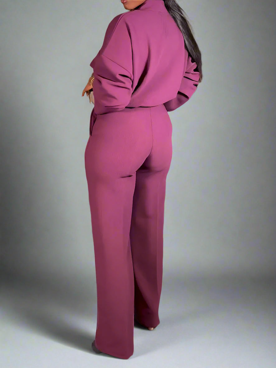 Person wearing a purple outfit in an indoor setting with 'Wishyear' branding.